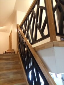 Escalier quart-tournant en hévéa avec garde-corps Éclipse à Béthune